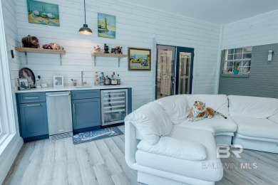 Located just one mile from downtown Fairhope, this 4BR/3.5BA