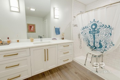 Located just one mile from downtown Fairhope, this 4BR/3.5BA