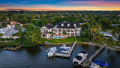 Discover this magnificent custom estate on the Loxahatchee River