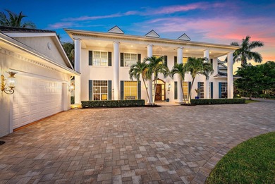 Discover this magnificent custom estate on the Loxahatchee River