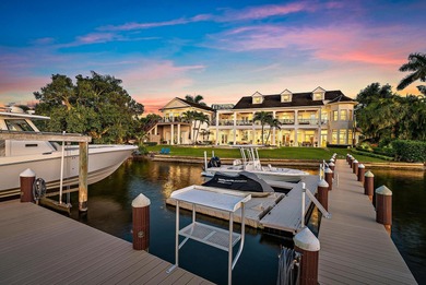 Discover this magnificent custom estate on the Loxahatchee River