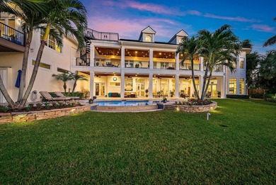 Discover this magnificent custom estate on the Loxahatchee River
