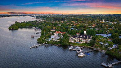 Discover this magnificent custom estate on the Loxahatchee River