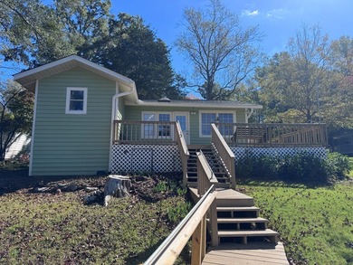 Welcome to your turnkey lake retreat on beautiful Pine Lake!