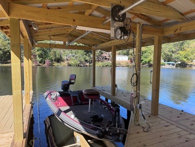 Welcome to your turnkey lake retreat on beautiful Pine Lake!