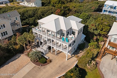 Absolutely stunning 2nd row home on elevated lot in Emerald Isle