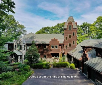 This distinctive architect designed residence with 3 floors and