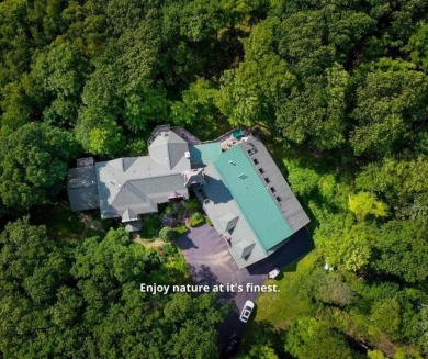 This distinctive architect designed residence with 3 floors and