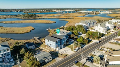 Brand-New Soundfront Construction in Surf City! This fully