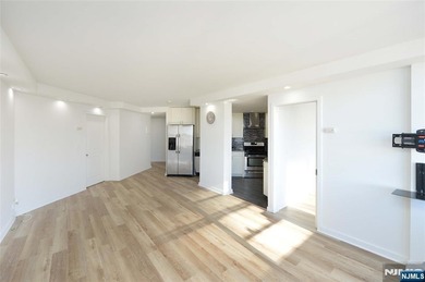 This beautifully renovated 2-bedroom, 2-bath 979 sft condo