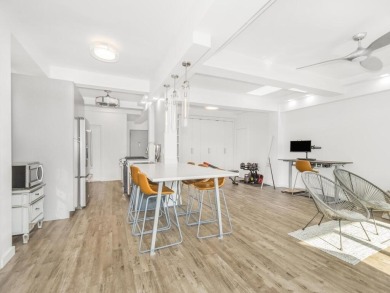 Step into this modern and uniquely customized home in Spuyten
