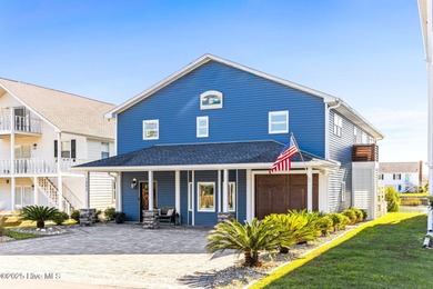 Experience coastal living at its finest in this fully renovated
