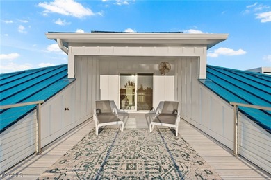 Situated in the serene heart of Bokeelia, this exquisite