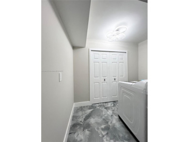 STUNNING HOME IN THE HEART OF TAMARAC. NEW ROOF NEW ELEVATOR ALL