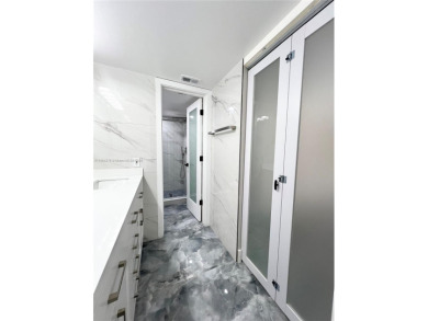 STUNNING HOME IN THE HEART OF TAMARAC. NEW ROOF NEW ELEVATOR ALL