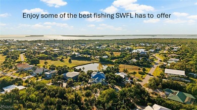 Situated in the serene heart of Bokeelia, this exquisite