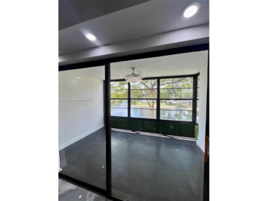 STUNNING HOME IN THE HEART OF TAMARAC. NEW ROOF NEW ELEVATOR ALL