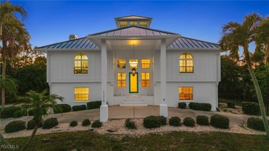 Situated in the serene heart of Bokeelia, this exquisite