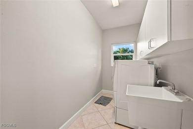 Situated in the serene heart of Bokeelia, this exquisite