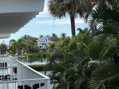 Live by the water in this charming 55+ community perfectly