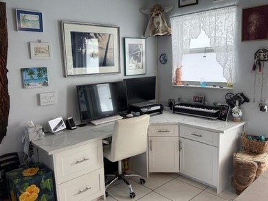 Live by the water in this charming 55+ community perfectly