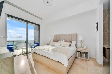 Discover the largest 2-bed + den residence available at Rise