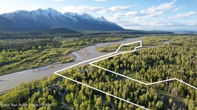 Set on the Snake River with 42.57 acres & dramatic Teton views