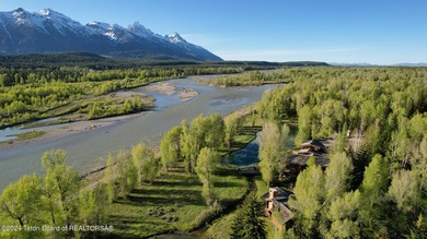 Set on the Snake River with 42.57 acres & dramatic Teton views