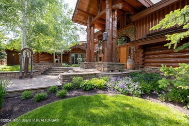 Set on the Snake River with 42.57 acres & dramatic Teton views