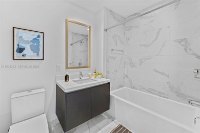 Perched high in the sky on the 26th floor, this exquisite 2