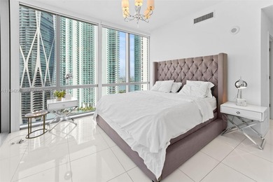 Perched high in the sky on the 26th floor, this exquisite 2