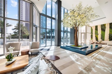 Perched high in the sky on the 26th floor, this exquisite 2