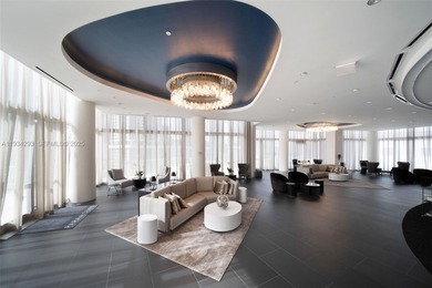 Perched high in the sky on the 26th floor, this exquisite 2