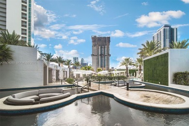 Perched high in the sky on the 26th floor, this exquisite 2