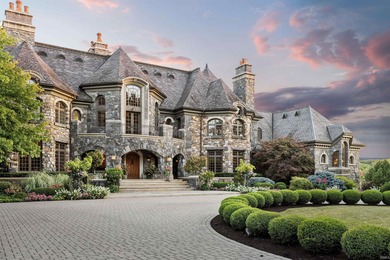 Behind the gates of this 40-acre European-inspired estate lies