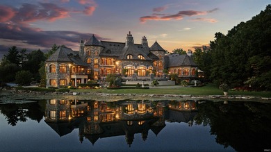 Behind the gates of this 40-acre European-inspired estate lies