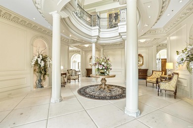 Behind the gates of this 40-acre European-inspired estate lies