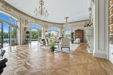 Behind the gates of this 40-acre European-inspired estate lies