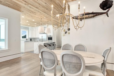 Experience Palm Court at Inlet Beach, a captivating boutique