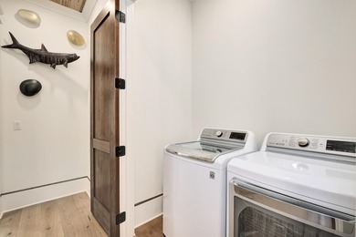 Experience Palm Court at Inlet Beach, a captivating boutique