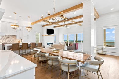 Anchored in the exclusive Palm Court enclave just south of 30A