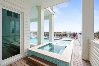 Anchored in the exclusive Palm Court enclave just south of 30A