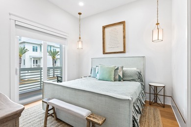 Anchored in the exclusive Palm Court enclave just south of 30A