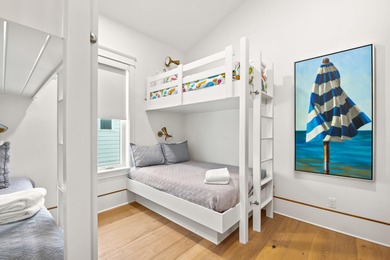 Anchored in the exclusive Palm Court enclave just south of 30A