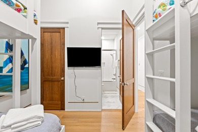 Anchored in the exclusive Palm Court enclave just south of 30A