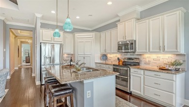 Luxury Coastal Living Awaits you at this beautiful elevated Key