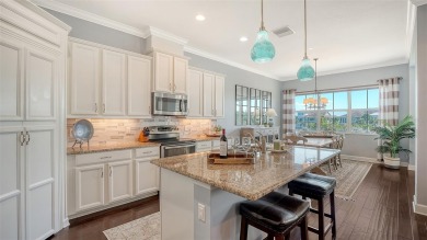 Luxury Coastal Living Awaits you at this beautiful elevated Key