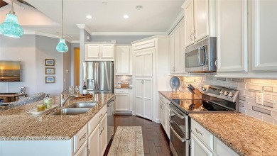 Luxury Coastal Living Awaits you at this beautiful elevated Key