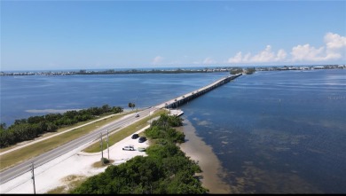 Luxury Coastal Living Awaits you at this beautiful elevated Key