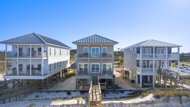 HIGHLIGHTS: - Beachfront beauty - Gorgeous Gulf views - 3 levels